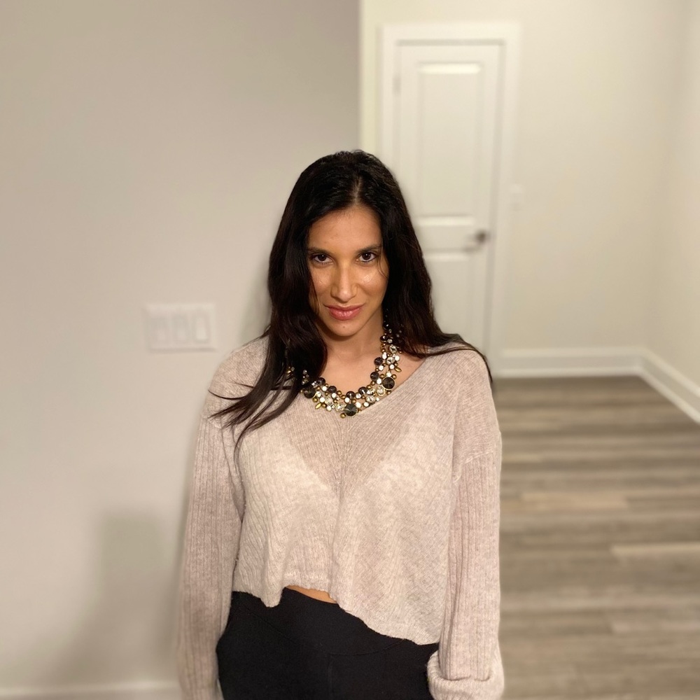 Statement necklace. Great with dresses/sweaters.